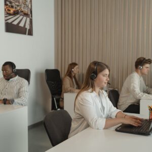 Four People Working in Call Center Office